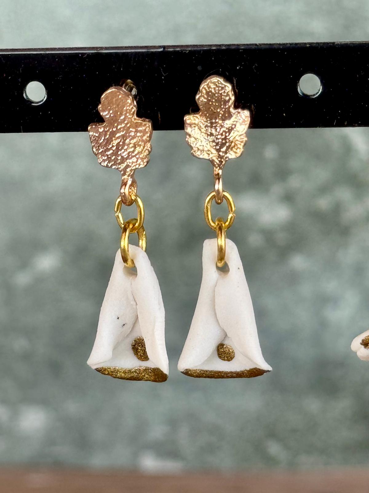 Oorring porselein klokje