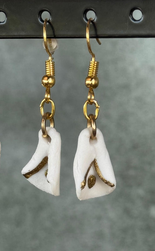 Oorring porselein klokje